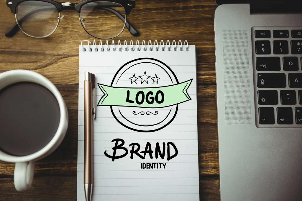 Monogram logo design ideas on laptop screen