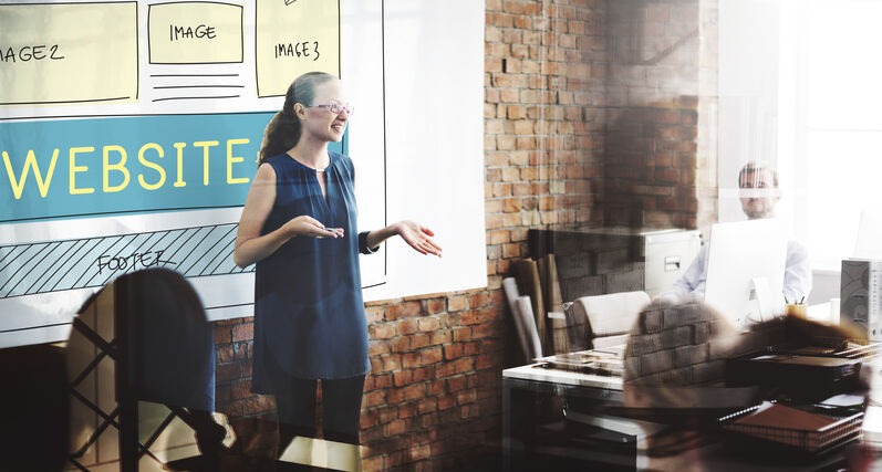 Designer presenting a modern website layout and user interface concept